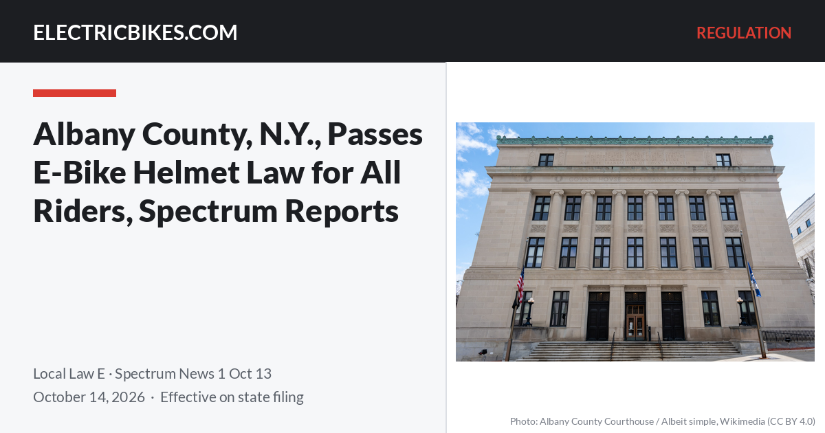 The Albany County Courthouse in Albany, New York, with the headline "Albany County, N.Y., Passes E-Bike Helmet Law for All Riders, Spectrum Reports" — ElectricBikes.com Regulation